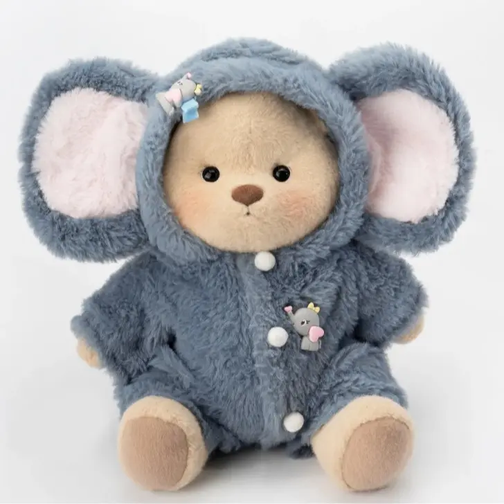 Fluffy Little Elephant With Brown Bear