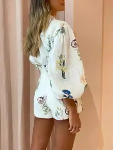 Trendy Vacation Two-Piece Set for Women – Boho Lantern Sleeve Blouse with Floral Print and Matching High Waist Shorts |   Feminine Look for Beach Photos, Festivals and Walks