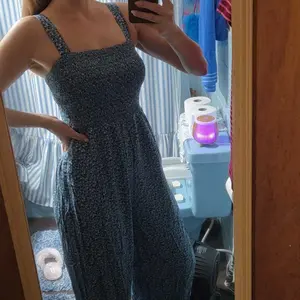 Dokotoo Women's Casual Loose Overalls Jumpsuits One Piece Sleeveless Printed Wide Leg Long Pant Rompers With Pockets Bohemian Womenswear