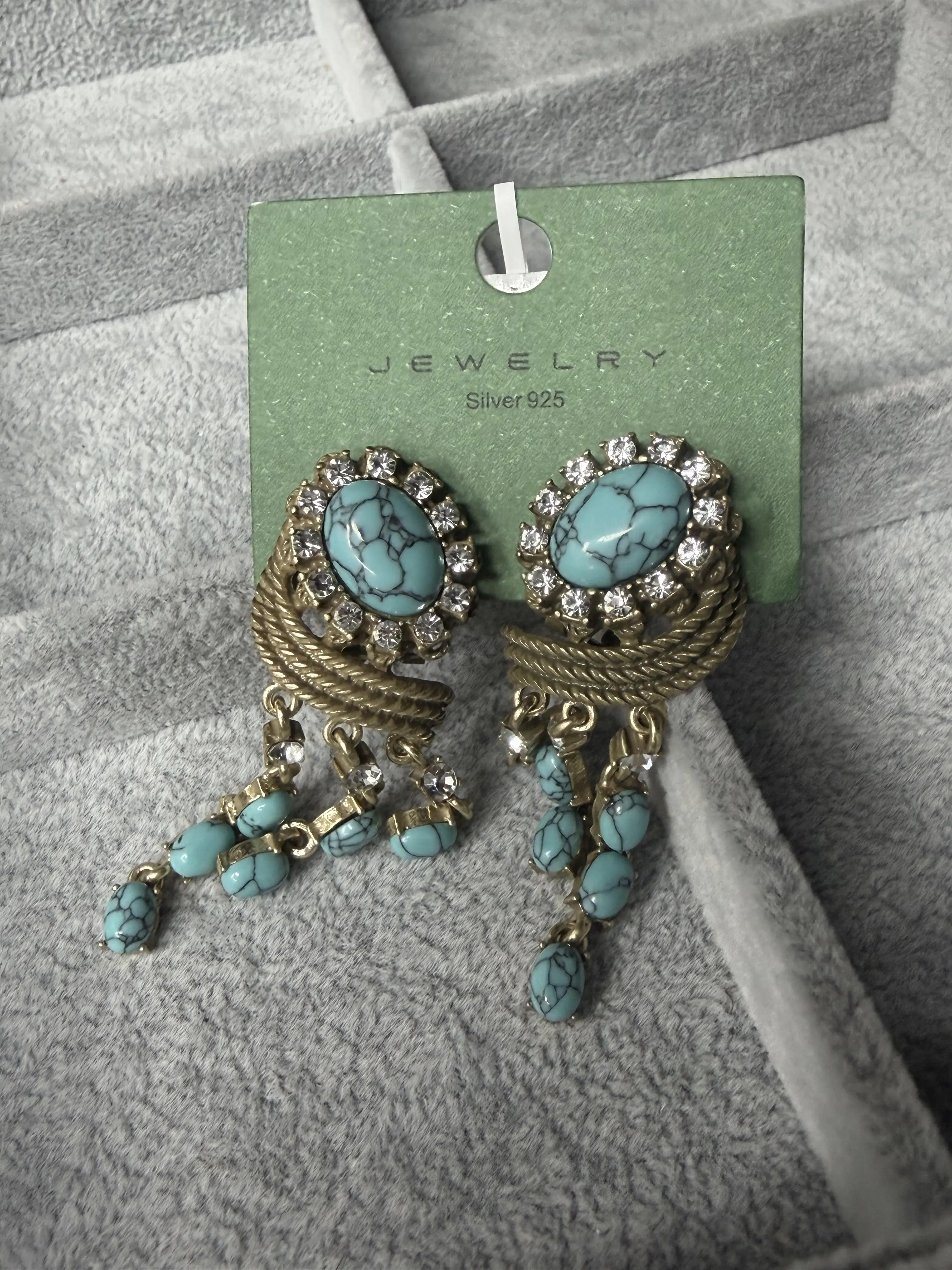 Simi(13076)gc.Large turquoise earrings, elegant and poised the moment you put them on!