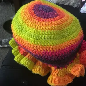 Colorful Crochet Hat with Ruffled Edges and Gradient Design for Stylish Wear in Bright Rainbow Colors
