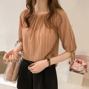 A Loose-Fitting Blouse with A One-Shoulder and A Striped Design, Suitable as A Base Layer for Women.