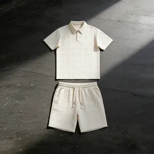 Short sleeved polo shirt shorts set, fashionable and comfortable waffle style short sleeved polo shirt elastic waist drawstring sports shorts two-piece set, college style suitable for daily street wear
