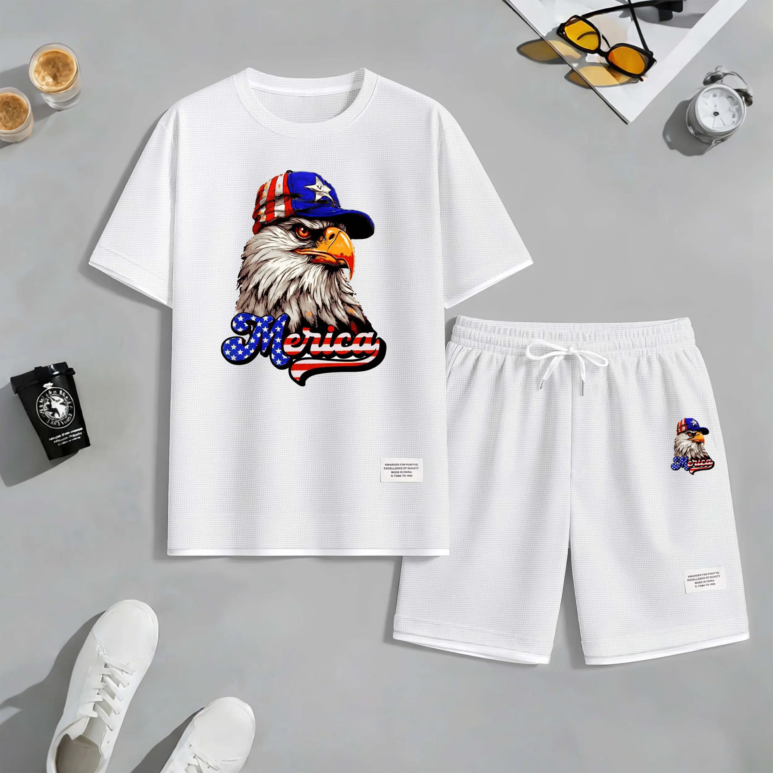 Men's American Eagle Print Drawstring Shorts Set For Spring/Summer. A Casual Summer Outfit, Including A Short-Sleeved Shirt And Shorts, Suitable For Everyday Wear And Sports. A Two-Piece Set For A Relaxed And Energetic Lifestyle.