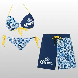 Corona Extra Couple Swimsuit Set, Floral Bandeau Top and String Bikini Bottom with Men’s Swim Shorts