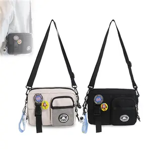Unisex Casual Crossbody Bag with Astronaut Charm Lightweight Nylon & Canvas Messenger Bag for Women with Random Color Badge Compact & Durable Material