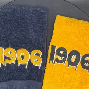 Alpha Phi Alpha 1906 Drip Stroll Towel in Black or Gold with Bold Number Design and Fringe Detailing