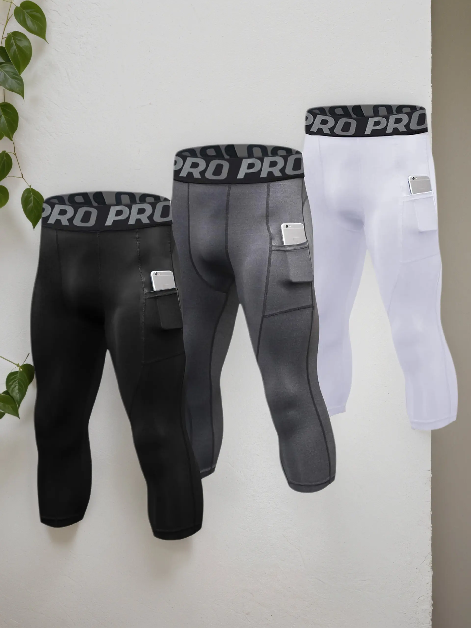 PRO Men's 3 Pack Compression Leggings 3/4 Capri Pants High Waist Sport Tights Quick Dry Yoga Gym Activewear with Letter Tape Pocket Joggers