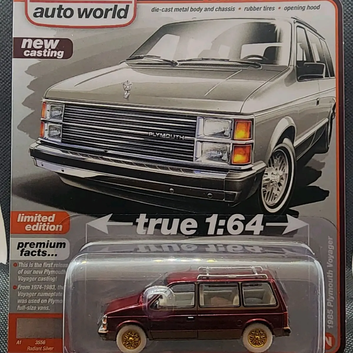 Auto World Mighty Minivans 1985 Plymouth Voyager Ultra Red Chase Diecast Model Toy Vehicle