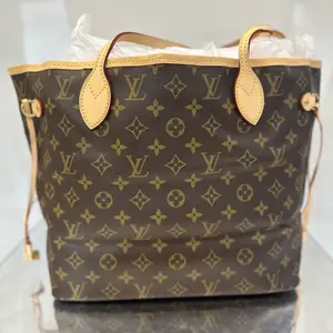Pre-owned LEATHER Tote Bags Louis Vuitton Neverfull MM in Monogram Canvas with Natural Vachetta Trim