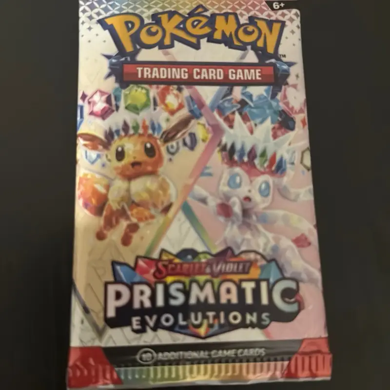 Pokemon prismatic evolutions booster pack rip and ship cards