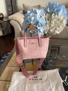 Pre-owned coach Coated Canvas Tote Bags City Mini Tote Bag Powder Pink with Adjustable Guitar Strap