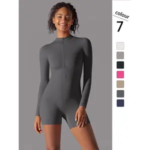 Women’s solid-color zip-up sports jumpsuit with thumb holes, long sleeves, and a stand-up collar—suitable for yoga, gym workouts, and all seasons. GARMENTARY