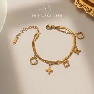 SheLuxeLife | Minimalist Double-Layer Four-Leaf Clover Titanium Steel Bracelet for Women – European and American INS Style, Elegant Fashionable Hand Accessory,