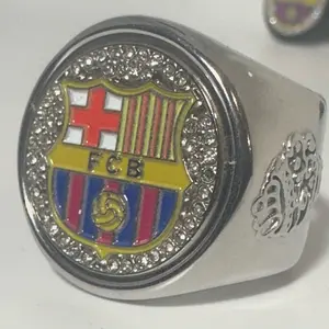 The BARCELONA deCAPitator ring bottle cap & can tab opener, busts open your favorite beverage with a flick of the wrist. Barcelona merchandise; Golf gift; SOCCER merchandise