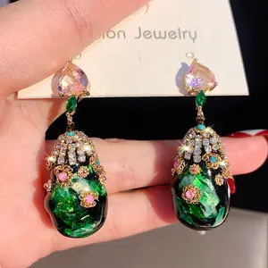 2026 new trendy high-end emerald-colored elegant retro and exquisite rhinestone earrings for women, a small-scale design with heart-shaped ear studs. Ideal for giving as gifts to friends, girlfriends, family members, significant others, or mothers.