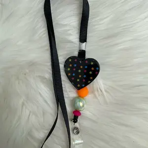 Colorful Stars on Heart Badge Reel Lanyard with Black Ribbon and Beaded Ends