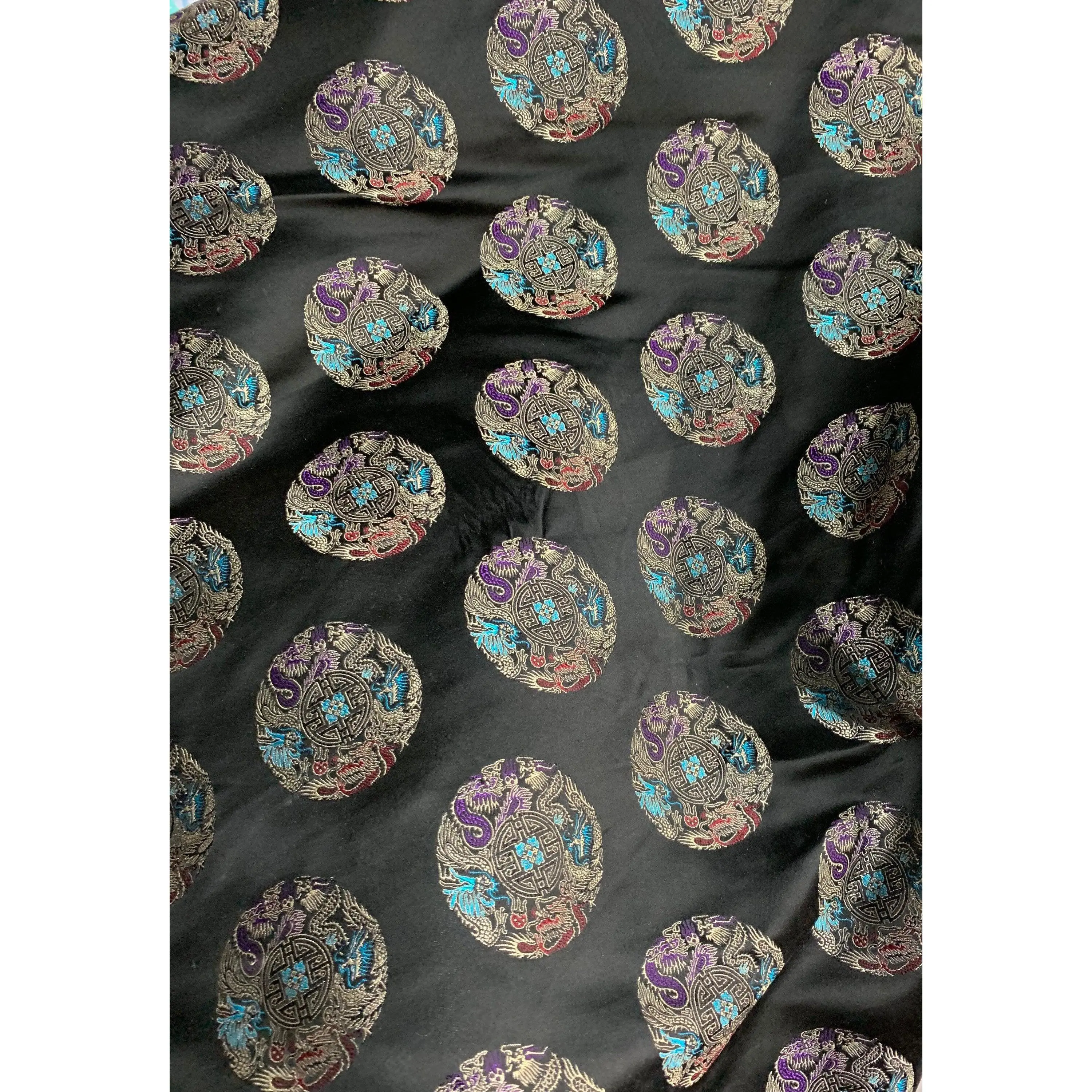 Beautiful medallion design rayon silk brocade 29” wide.  Best used for apparel. Sold by the yard