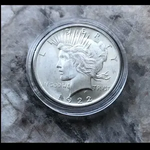 1922 SILVER PEACE DOLLAR IN BRILLIANT UNCIRCULATED CONDITION