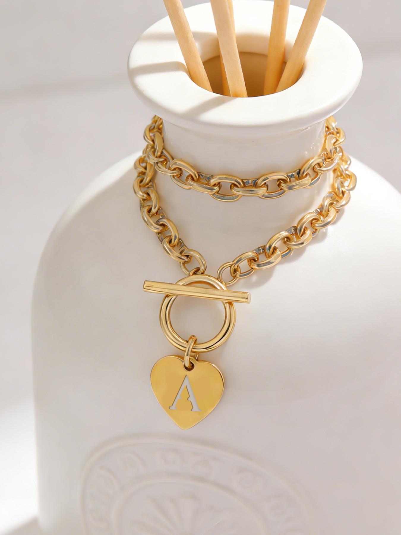 Fashionable and elegant necklace featuring a hollow letter pendant; the OT clasp is die-cast molded, stainless steel chain necklace for women with an OT clasp—suitable for everyday wear, vacations, dates, and more; also serves as a delightful, surprising
