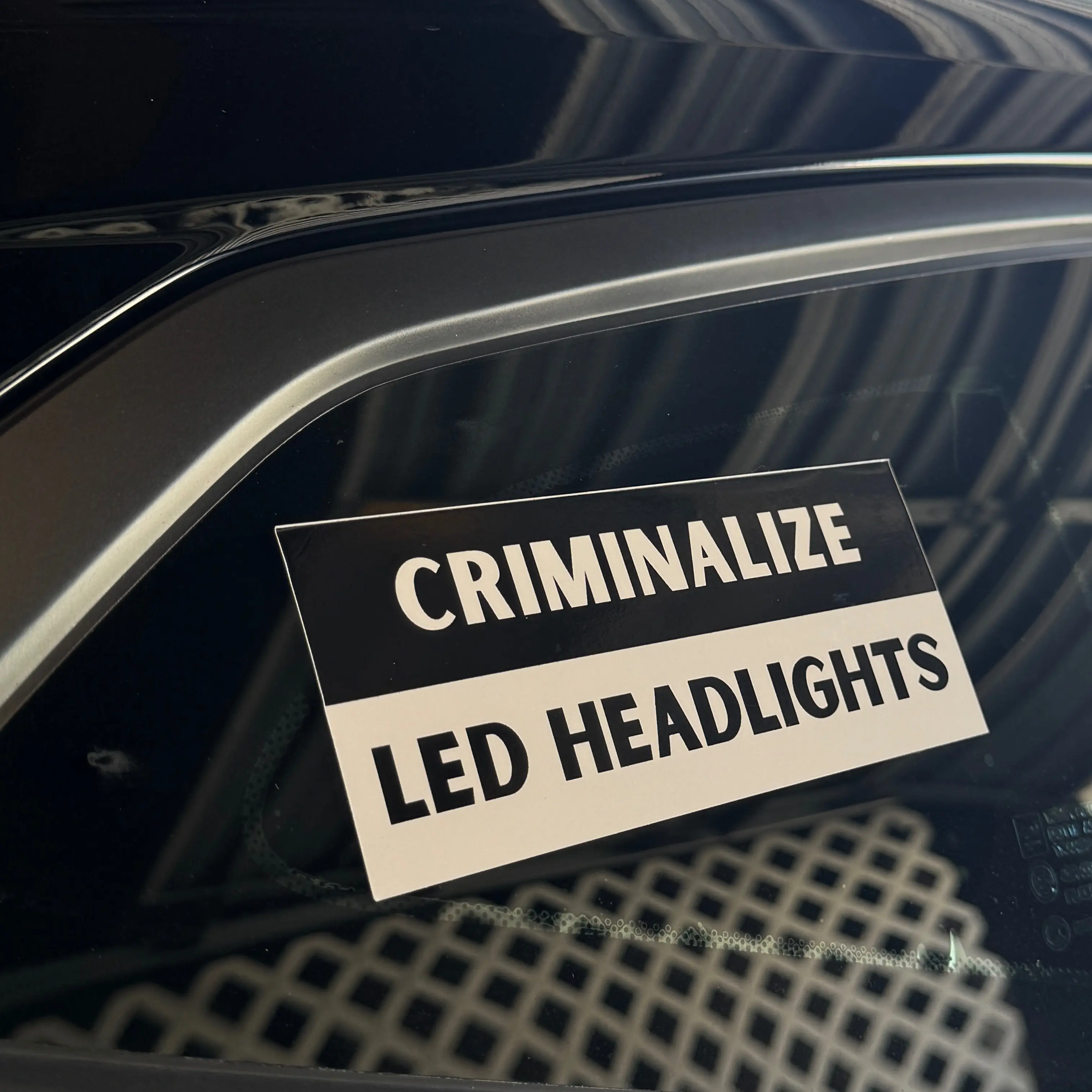 Criminalize Led Headlights - Car sticker