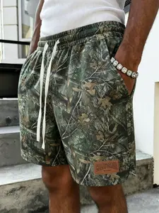 Men's shorts with a camouflage branch print pattern and a delicate leather tag design. Simple and stylish, made of breathable mesh fabric, suitable for everyday wear and vacations.