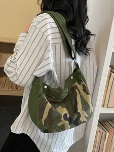 1pc Retro camouflage patchwork canvas crossbody bag, with widened adjustable shoulder straps and buckle details, suitable for daily commuting and street casual fashion dressing scenes.