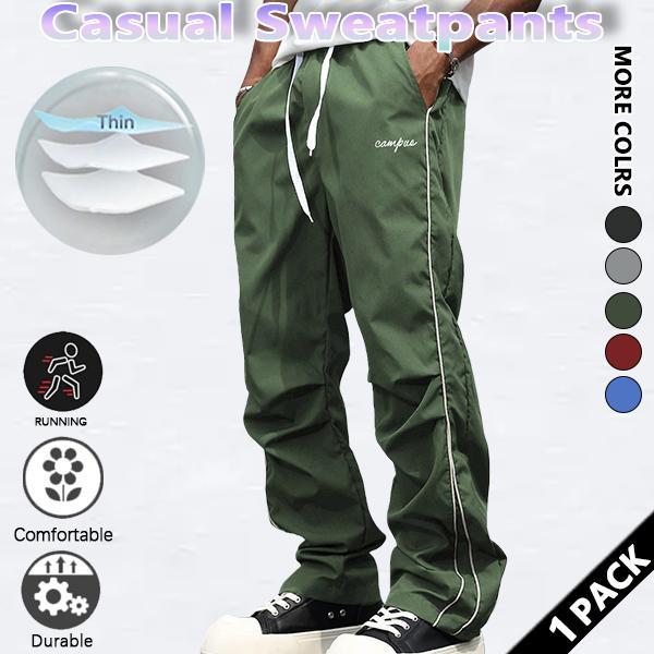 Loose-fitting sweatpants for men, grey side stripes with gold accent stripes, comfortable design, sports casual style bottoms, sweatpants, fitness wear, today's fashion outfit