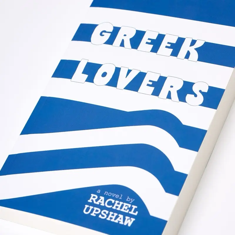 Signed copy of Greek Lovers, a women’s fiction romantic comedy by Rachel Upshaw about going to Greece and chasing your dreams