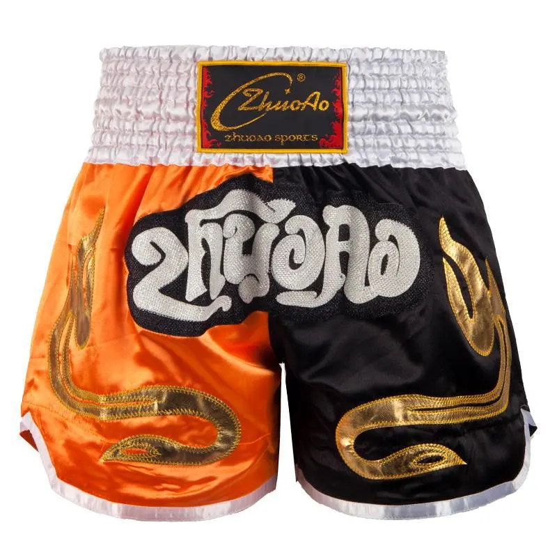 Orange and black spliced Muay Thai pants