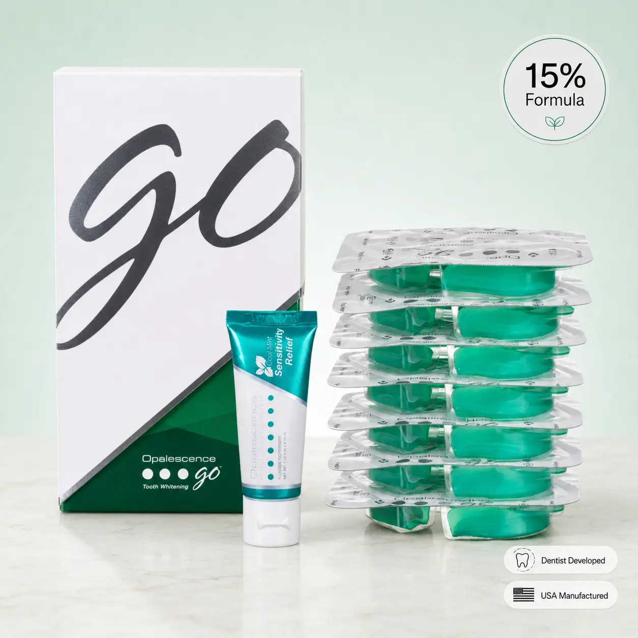 Opalescence Go 15% Hydrogen Peroxide Teeth Whitening Bundle - (7 Treatments) Prefilled Whitening Trays & Travel Sensitive Whitening Toothpaste 1 Oz - Mint