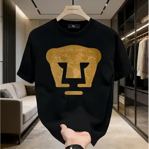LIGA MX PUMAS UNAM Football Club 100% Cotton High-Quality Sweatshirt Black Pullover Stretch Menswear Tops Crewneck Short Sleeve T-Shirt with Gold Emblem and Text for Casual Wear