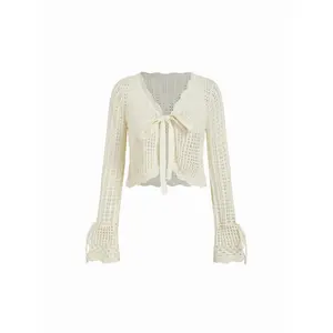 Cider Knit V-Neck Knotted Hollow Out Bell Sleeve Cropped Oversized Top