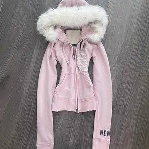 Vintage American pink faux fur hooded sweatshirt with cinched waist, Y2K cropped sweater alternative outerwear that can be worn with a raincoat