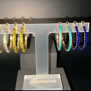 Gold Hoop Rhinestone Earrings with Colorful Beads on Display Stand