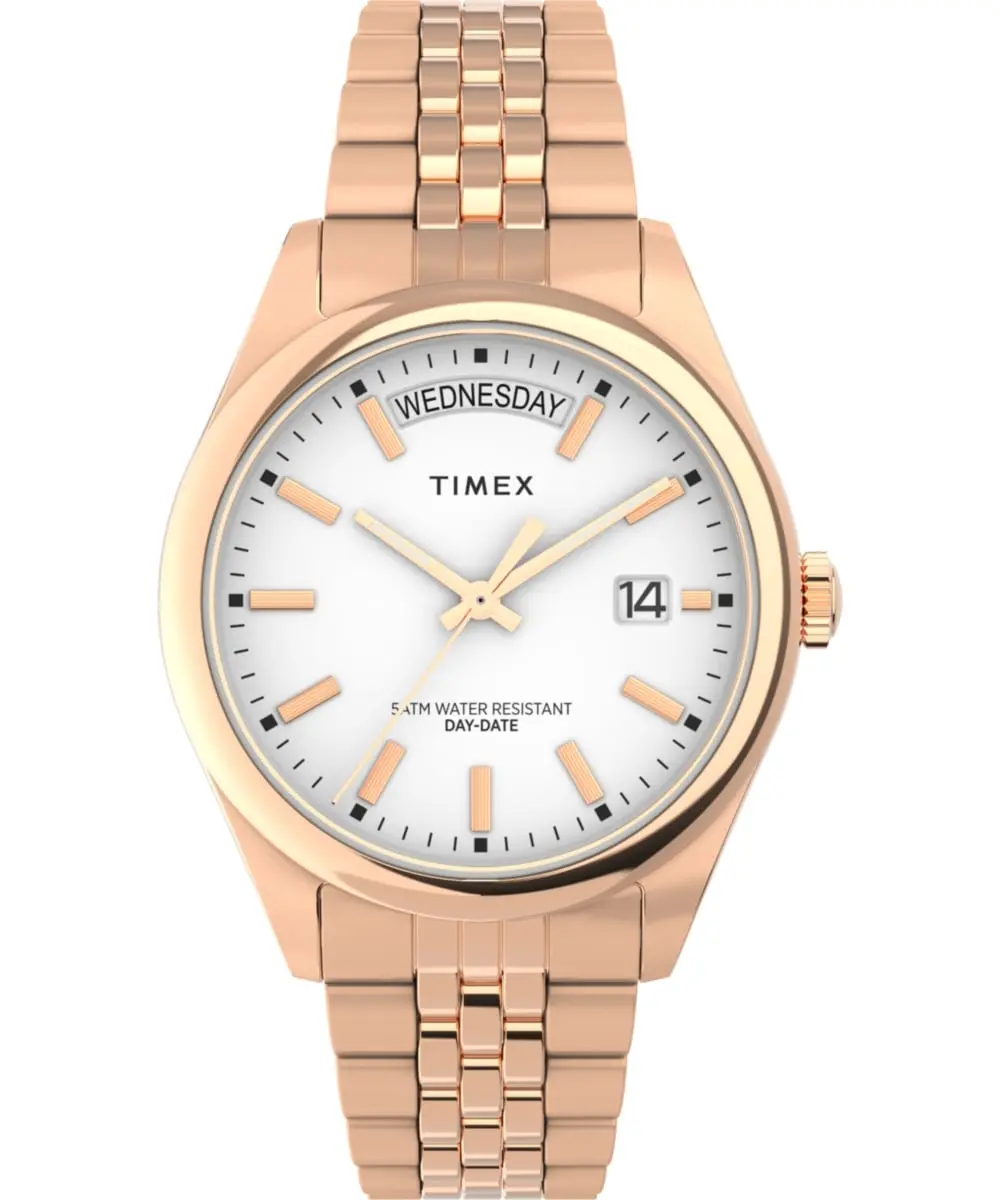 TIMEX Trend Legacy Ladies Watch, 36mm Cushion-Shaped Rose Gold-Tone Stainless Steel with Day-Date Calendar, Index Hour Markers and Deployment Clasp, Analog, Analog Dial