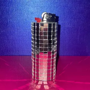 Disco ball tile covered lighter sleeve