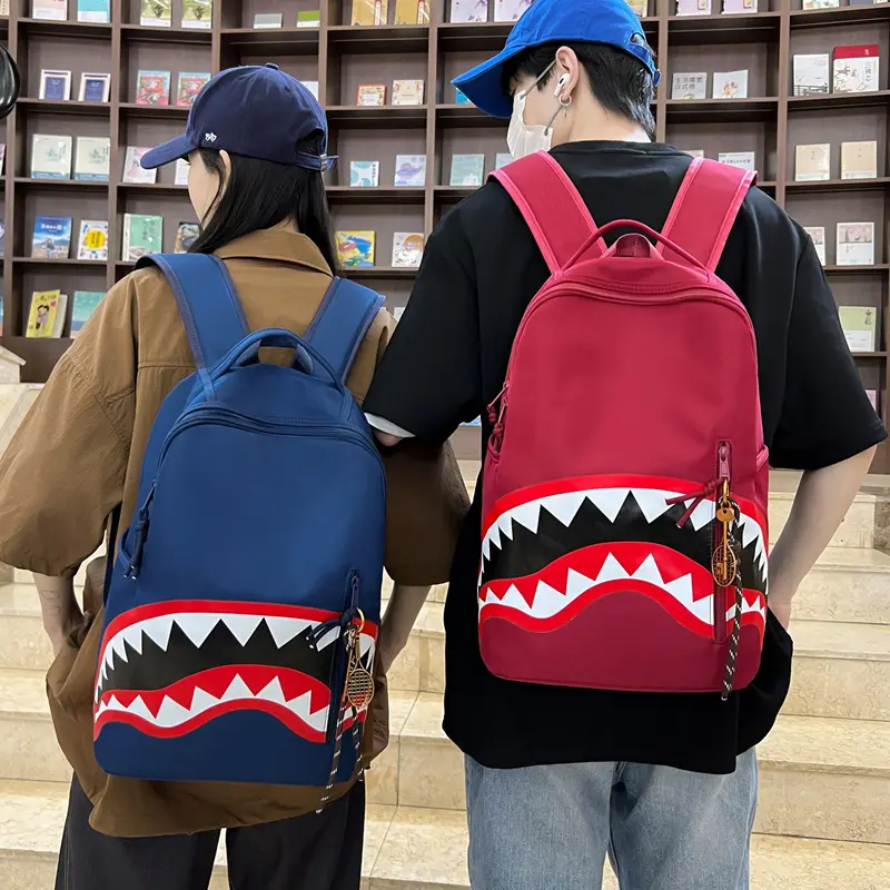 Comfortable backpack, trendy brand "Shark Backpack" with graffiti design. High appearance quality, large capacity, suitable for casual street wear, double-shoulder skateboard backpack.