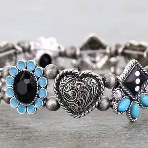 Western Heart And Dice Themed Stretch Bracelet Available In Two Styles Black Or AB Stone With Unique Design Elements