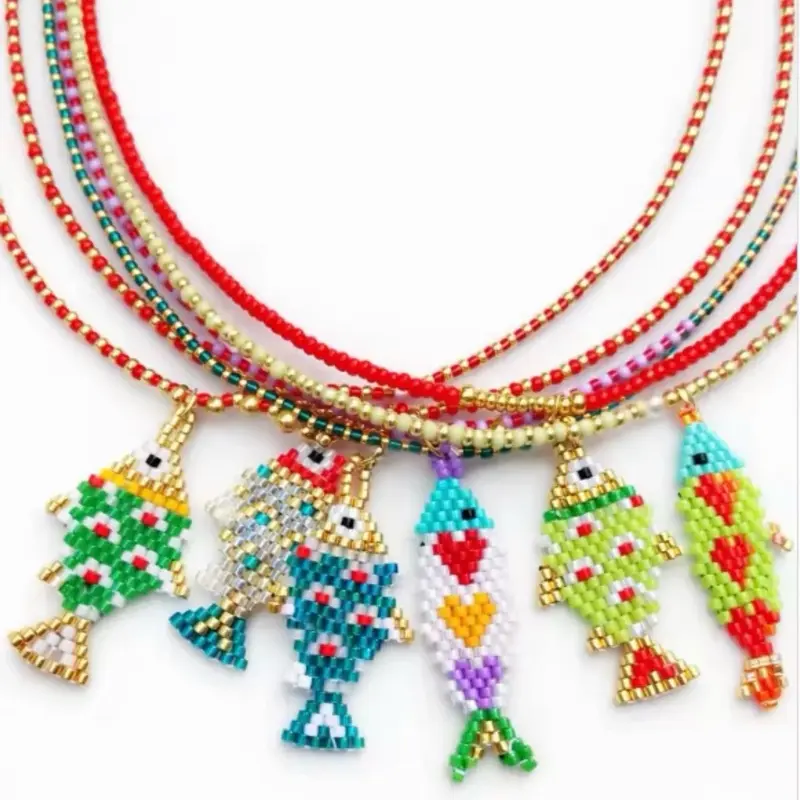 Spectacular summer puka shell necklaces featuring colorful Miyuki fish. The perfect accessory to add a fresh, vibrant, and unique touch to your look. ️