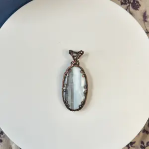 Blue Opal wire wrapped pendent in oxidized copper