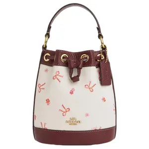 Coach Dempsey Logo Drawstring Bucket Bag for Women, Bow-Printed Coated Canvas and Pebbled Leather, White and Red
