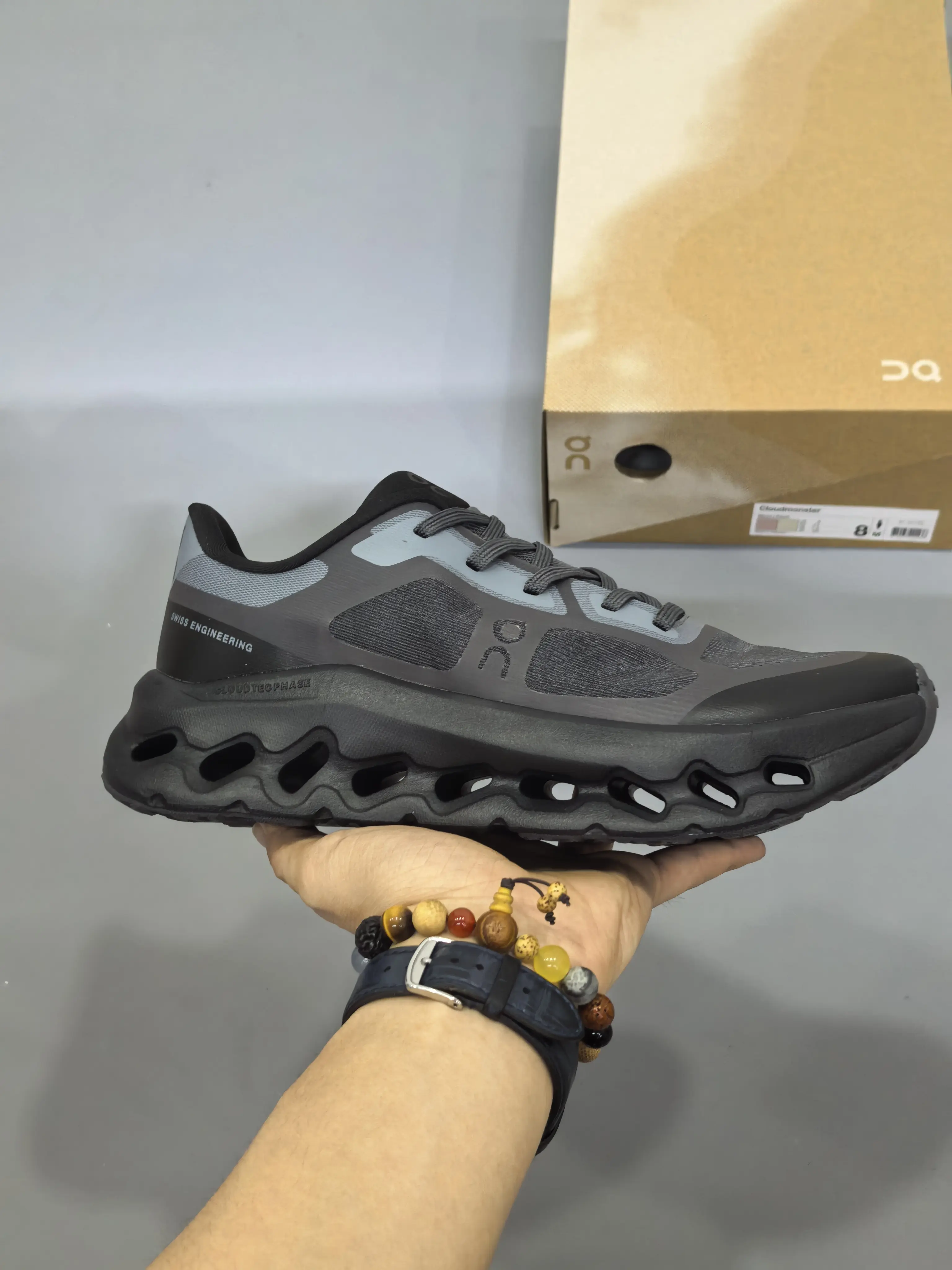 Running hiking sneakers with hollow wave cushioned midsoles & lightweight responsive shock absorption for all-terrain outdoor activities, premium tear-resistant breathable knit mesh in gradient dark charcoal black, textured gum rubber outsole