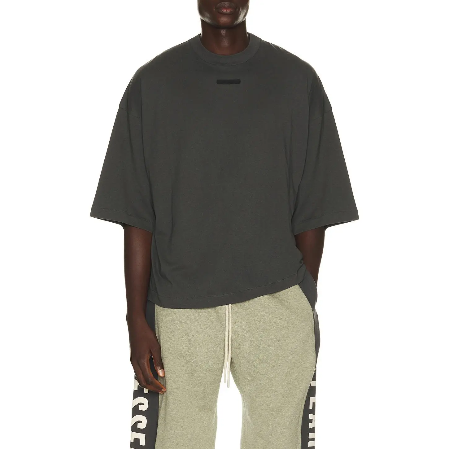 Fear of God ESSENTIALS Merch Tee in Iron Grey Fear of God ESSENTIALS Merch Tee in Iron Grey