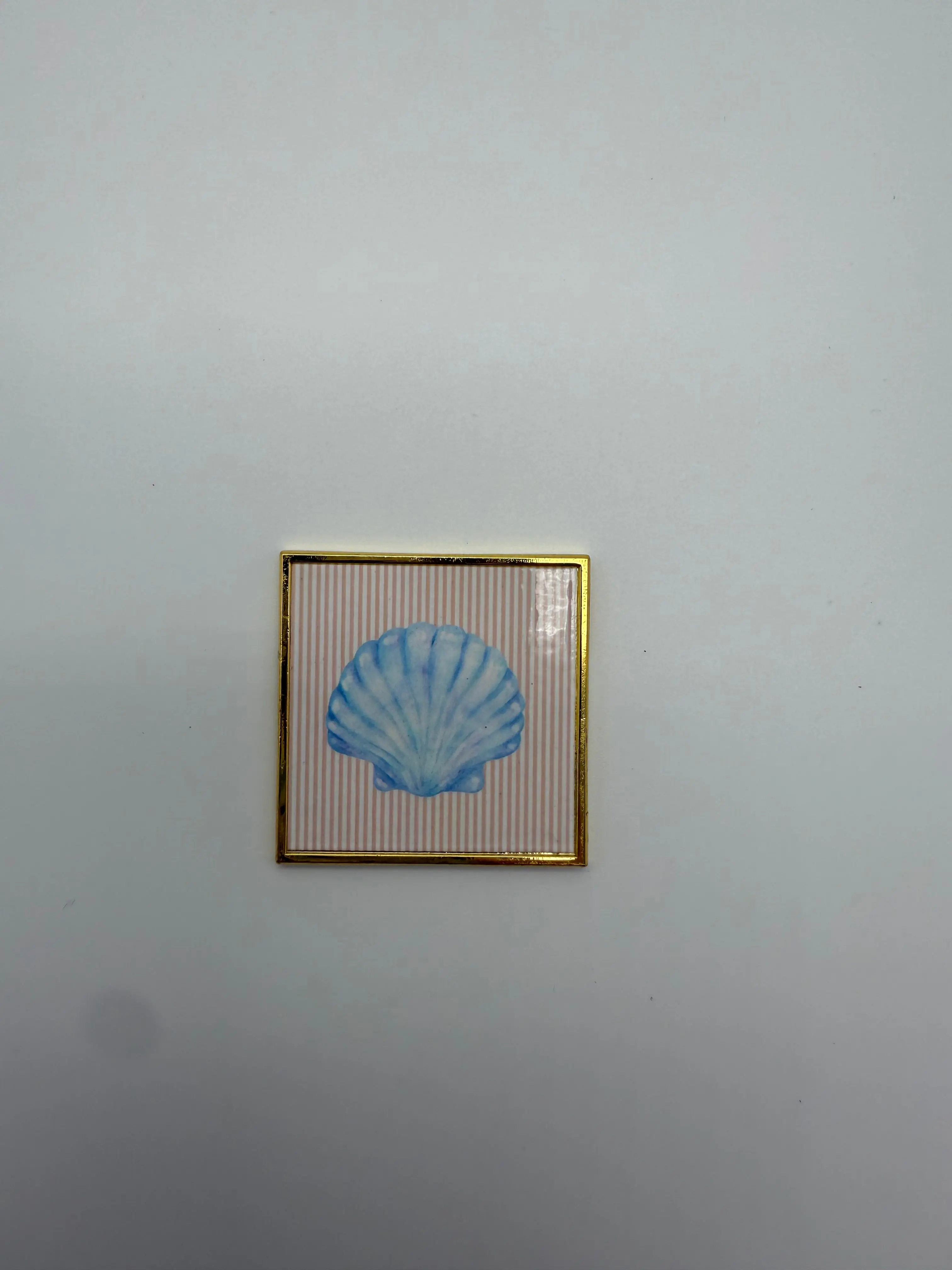Shell needle minder
