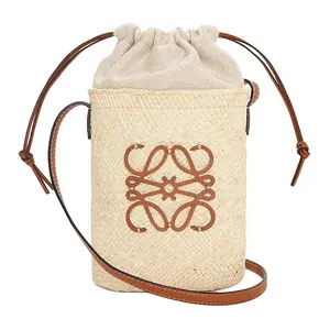 LOEWE Bucket Series Drawstring Logo Closure Ilaka Palm Leaf Leather Crossbody Bag for Women in Natural and Tan