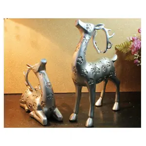 Elegant Pair of Silver Gazing Deer Sculptures with Antlers