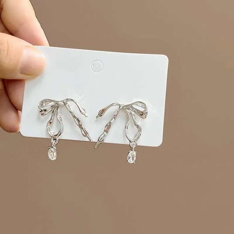 Trendy Liquid Metal Bow Knot Earrings for Women Punk Y2k Silver Color Metal Rhinestones Charms Stud Earrings Hollow Out Jewelry