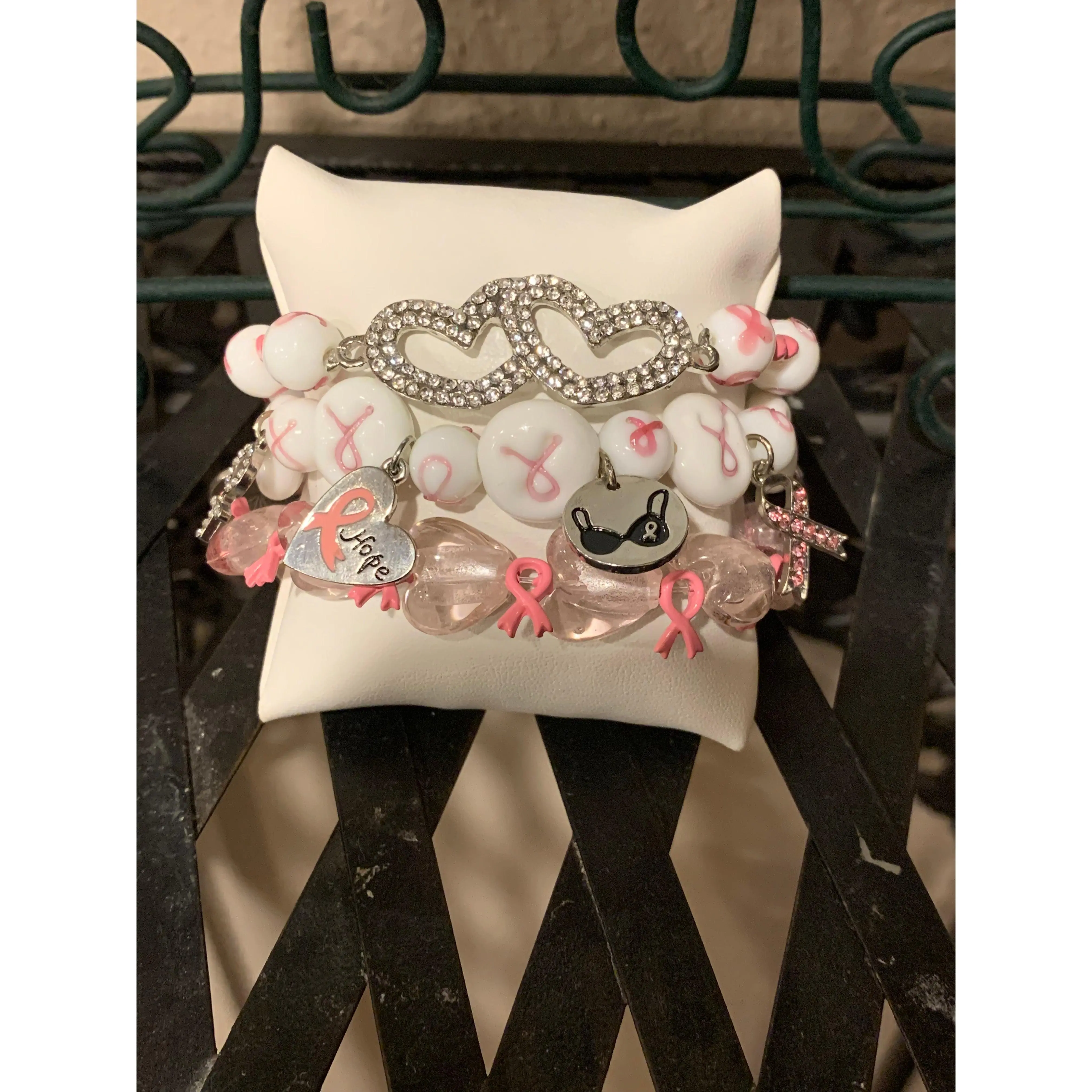 Pink ribbon bracelet set with silver double gold hearts