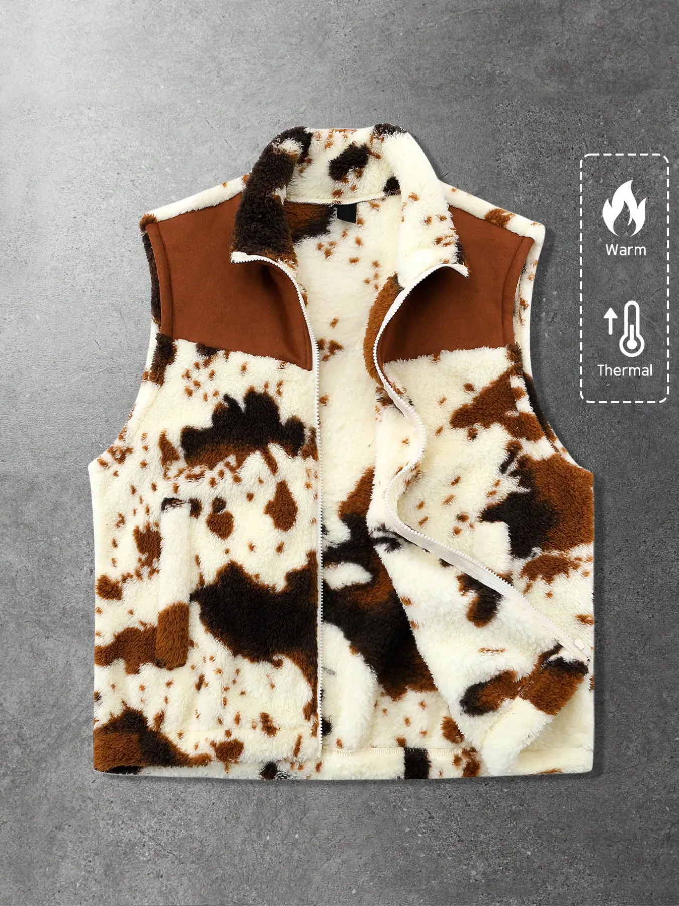 This men's streetwear fleece sleeveless vest features a cow print and patchwork design, creating a casual streetwear style that's perfect for fall and winter.